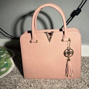 Sophisticated Blush Satchel with Tassel Charm